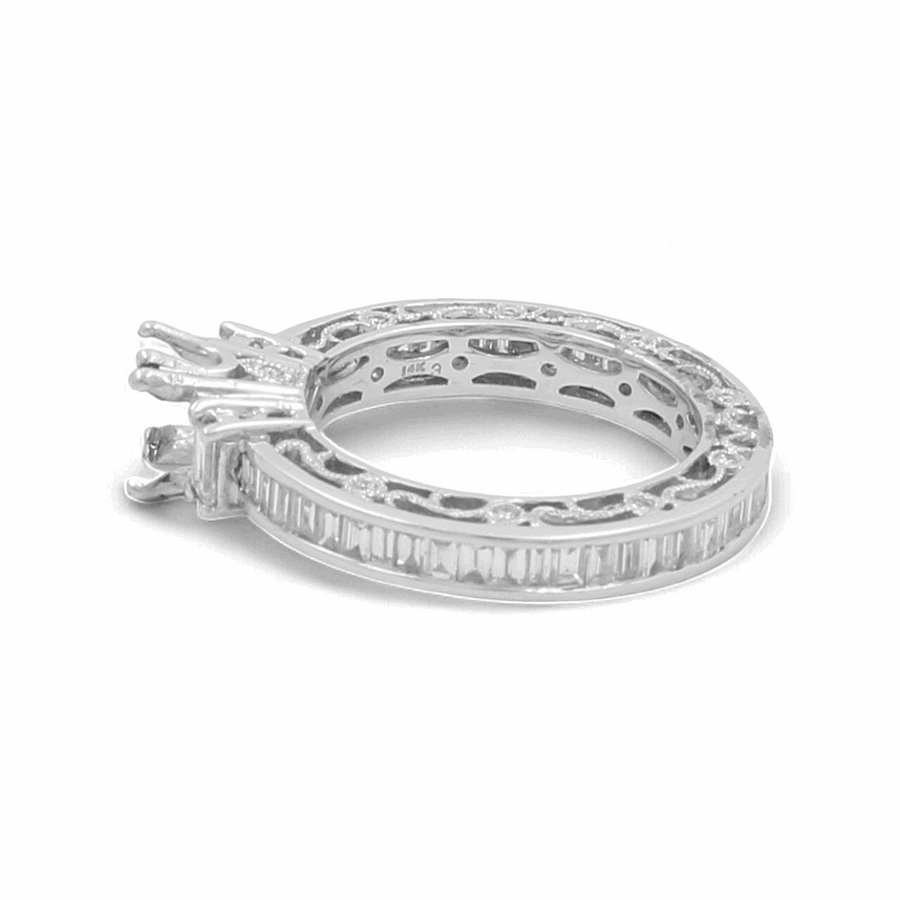 The Miral Jewelry 14K White Gold Bridal Woman's Ring with Diamonds features a stunning silver band encrusted with small, rectangular diamonds and an empty prong setting, making it perfect for completing any wedding day ensemble.