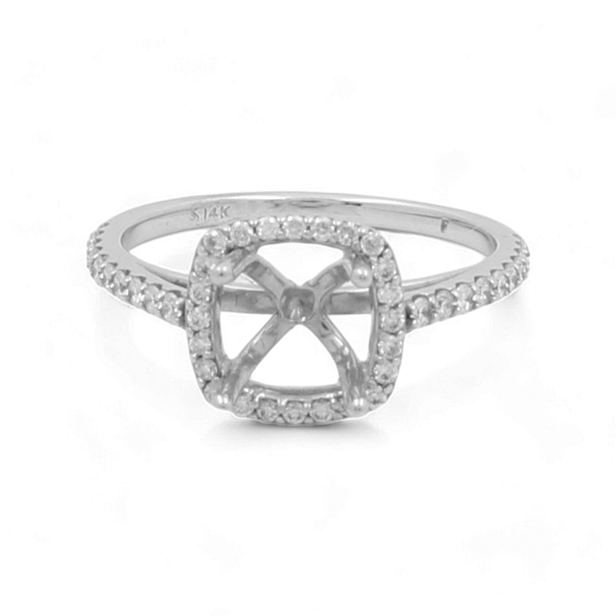 The 14K White Gold Bridal Woman's Ring with Diamonds by Miral Jewelry features a square prong setting on the band and delicate diamond accents, exuding timeless beauty.