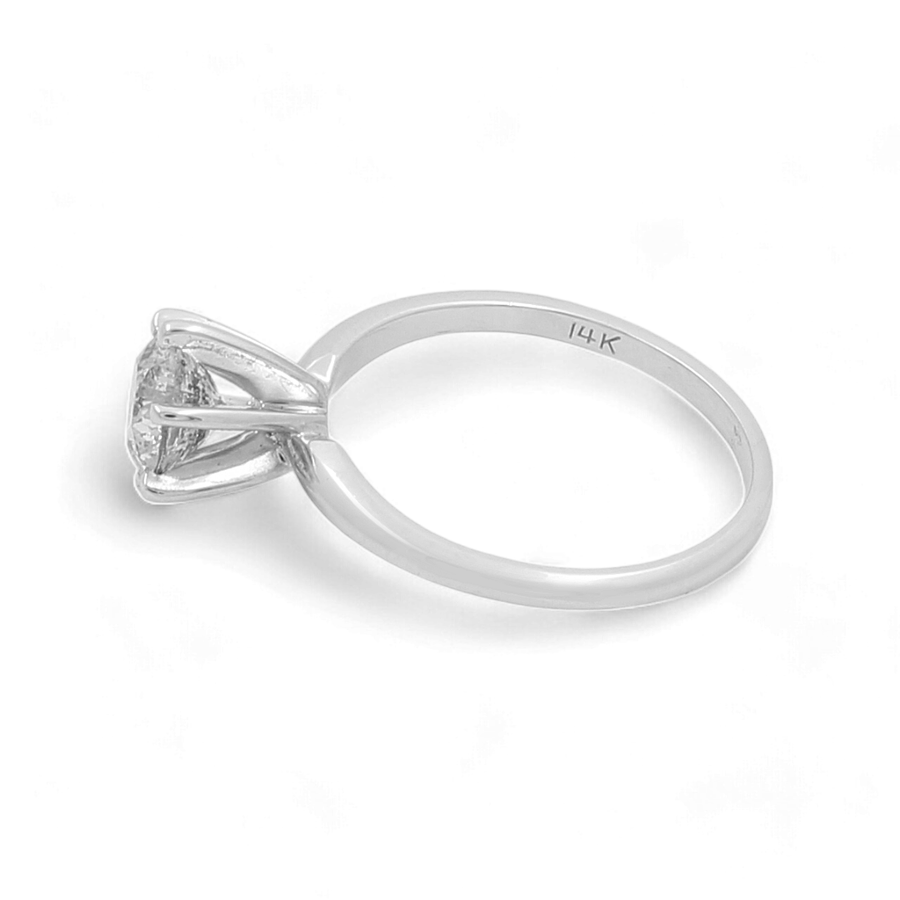 An elegant 14K White Gold Bridal Woman's Ring with Diamonds from Miral Jewelry is showcased on a pristine white background.