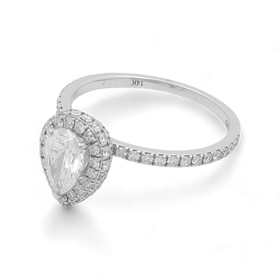 Discover the Miral Jewelry 14K White Gold Bridal Woman's Ring with Diamonds, showcasing a stunning pear-shaped diamond surrounded by smaller diamonds in an elegant halo and band design — the perfect adornment for your wedding day.