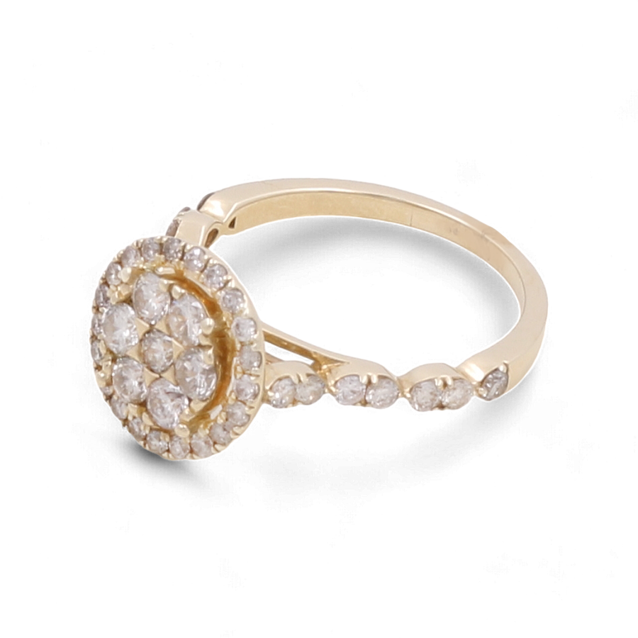 The Miral Jewelry 14K Yellow Gold Bridal Woman Ring with Diamonds showcases a stunning round cluster of diamonds on the top and is adorned with small diamonds along the band.