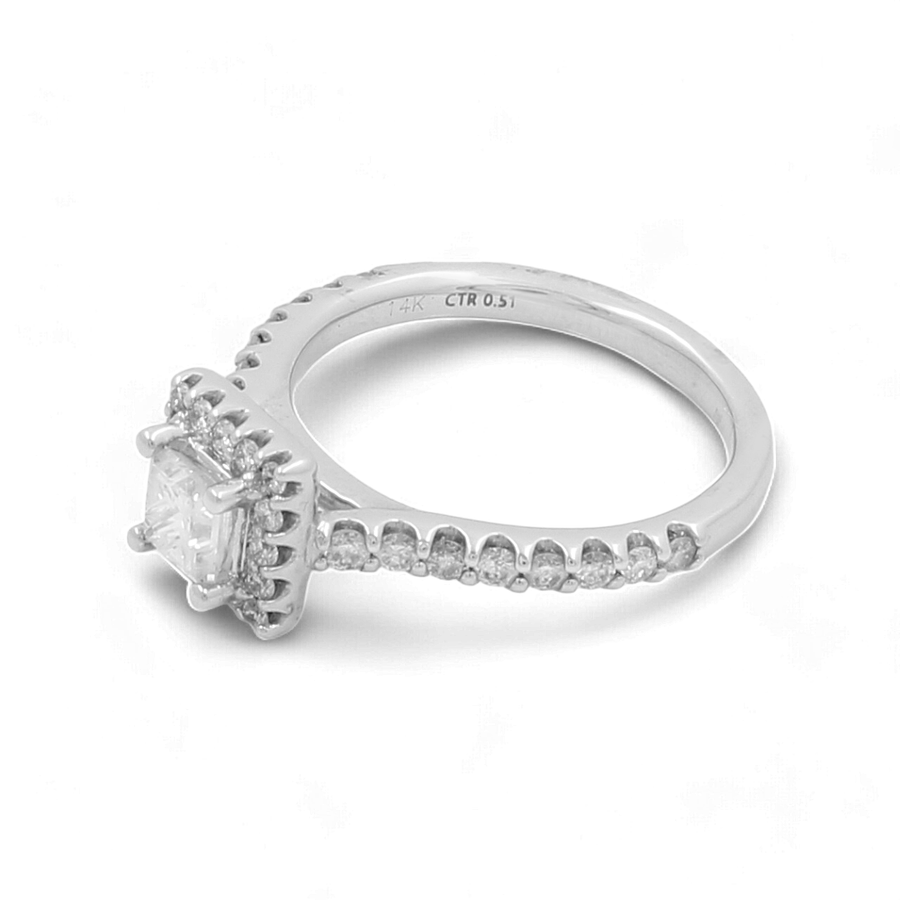 Miral Jewelry's 14K White Gold Bridal Woman Ring with Diamonds features a handcrafted design, showcasing a central square-cut diamond and a band adorned with smaller diamonds.