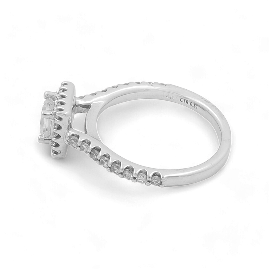 The Miral Jewelry 14K White Gold Bridal Woman Ring with Diamonds is a breathtaking piece, featuring a handcrafted silver ring adorned with a central square diamond, flanked by smaller diamonds along the band.