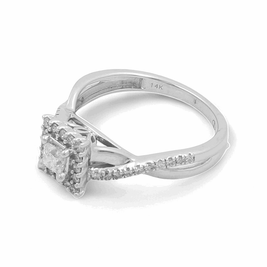 The Miral Jewelry 14K White Gold Bridal Woman Ring with Diamonds features a square-cut diamond center stone, surrounded by smaller diamonds, and boasts a twisted diamond-accented band.