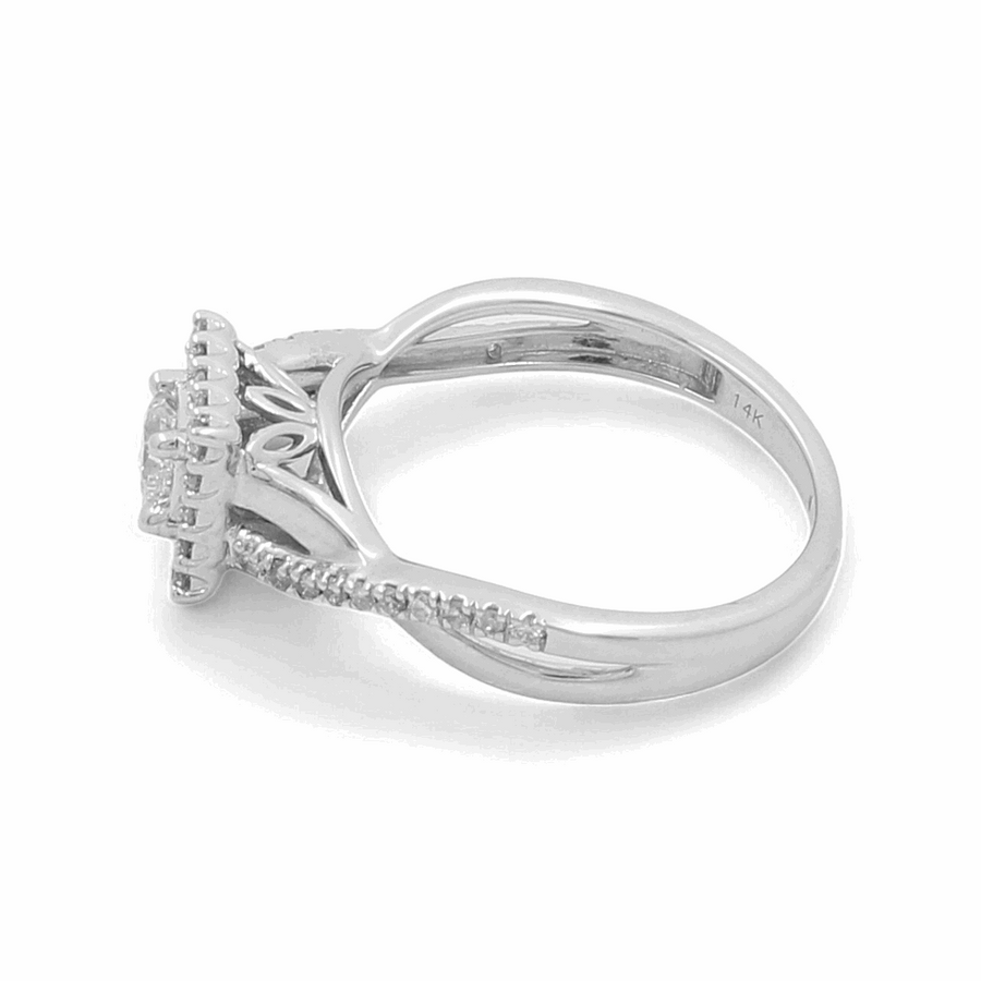 Miral Jewelry's 14K White Gold Bridal Woman Ring with Diamonds showcases a central cluster of diamonds, elegantly complemented by additional diamonds set along the band and intricate detailing on the sides.