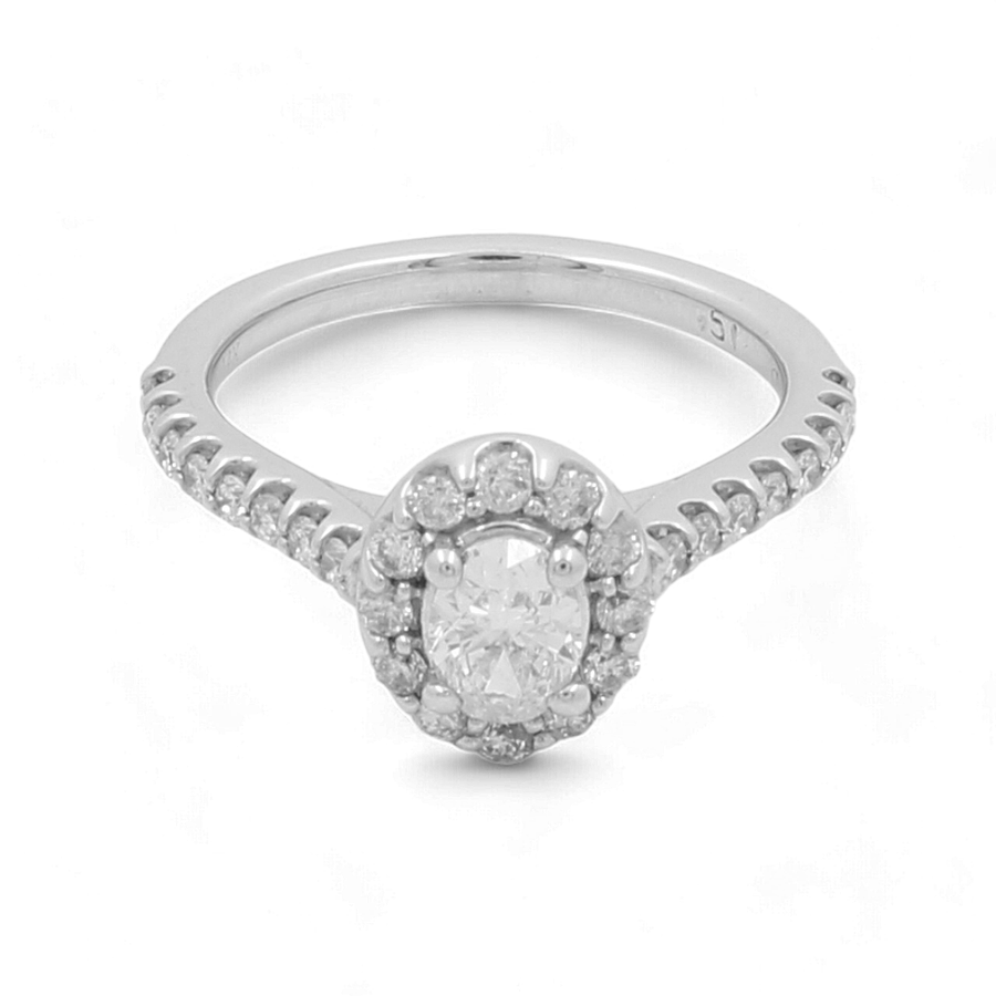 Presenting the Miral Jewelry 14K White Gold Bridal Woman Ring with Diamonds, this stunning piece showcases a central round diamond surrounded by smaller diamonds, complemented by additional diamonds encrusted along part of the band.