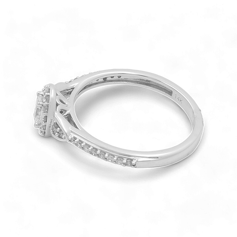 Presenting the Miral Jewelry 14K White Gold Bridal Woman Ring with Diamonds, a breathtaking piece featuring a square-shaped diamond setting and encrusted smaller diamonds along the band, ideal for an exquisite engagement.