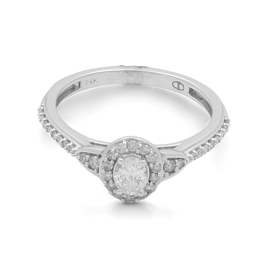 Presenting the Miral Jewelry 14K White Gold Bridal Woman Ring with Diamonds, a breathtaking piece featuring a central gemstone surrounded by shimmering diamonds along the band. The inside of this elegant ring is beautifully engraved with "14K.