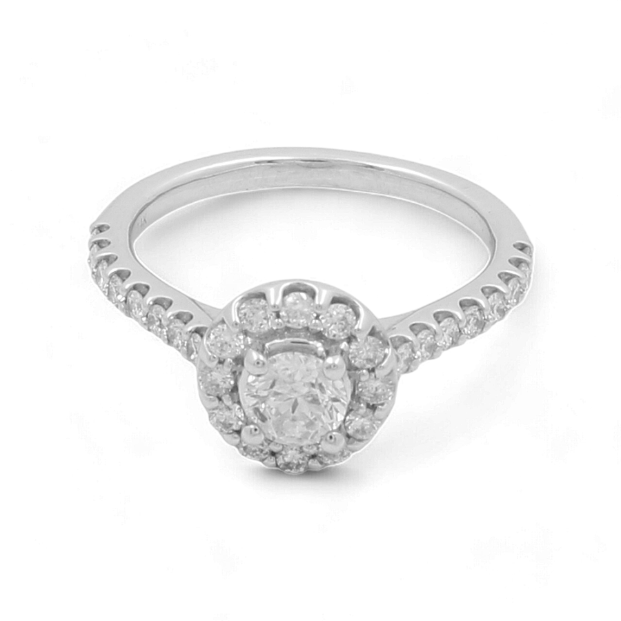 The Miral Jewelry 14K White Gold Bridal Woman Ring with Diamonds showcases a circular diamond center stone encircled by smaller diamonds, complemented by additional diamonds along the band.