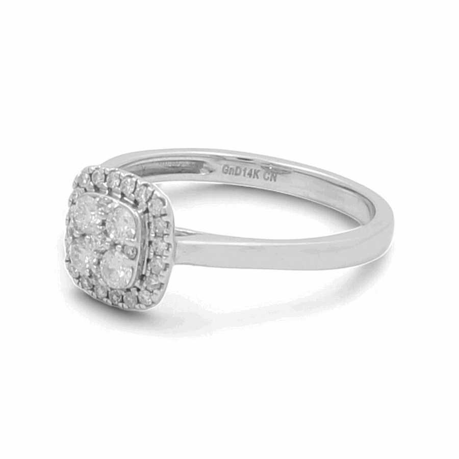 Introducing the 14K White Gold Bridal Woman Ring with Diamonds by Miral Jewelry, a captivating piece featuring a square cluster of scintillating diamonds on an elegant band, making it an ideal engagement ring.