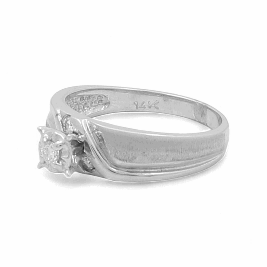 A stunning 14K white gold bridal woman's ring from Miral Jewelry, featuring a central square zirconia setting and engraved with "14K" on the inner band.