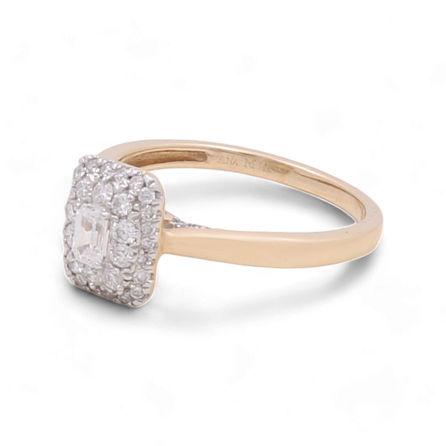 The Miral Jewelry 14K Yellow Gold Bridal Woman Ring features a square cluster of small diamonds surrounding a stunning 1-carat central diamond on a plain band, making it the perfect choice for bridal jewelry.