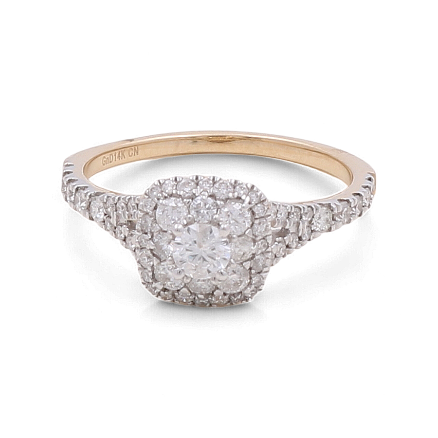 The Miral Jewelry 14K Yellow Gold Bridal Woman Ring with Diamonds features a central round diamond encircled by smaller diamonds in a halo design, complete with additional diamonds set along the band.