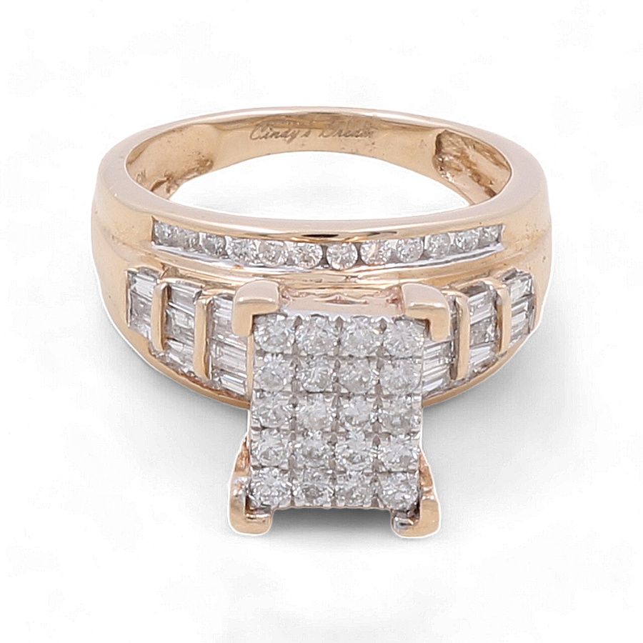 Introducing the Miral Jewelry 10K Yellow Gold Bridal Woman Ring with Diamonds, a stunning piece featuring numerous small diamonds encrusted on the band and a breathtaking larger square cluster of diamonds as its centerpiece.