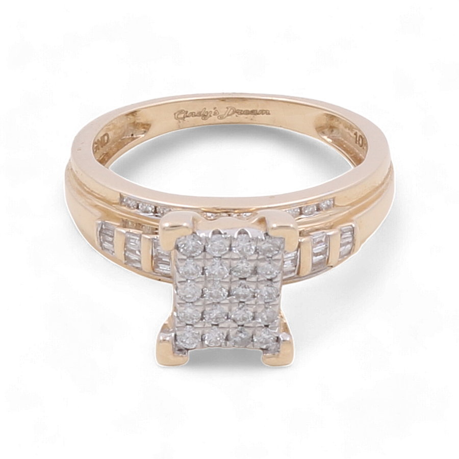 The 10K Yellow Gold Bridal Woman Ring with Diamonds by Miral Jewelry showcases a square cluster of small diamonds at its center, complemented by rows of luxurious diamonds adorning the band.