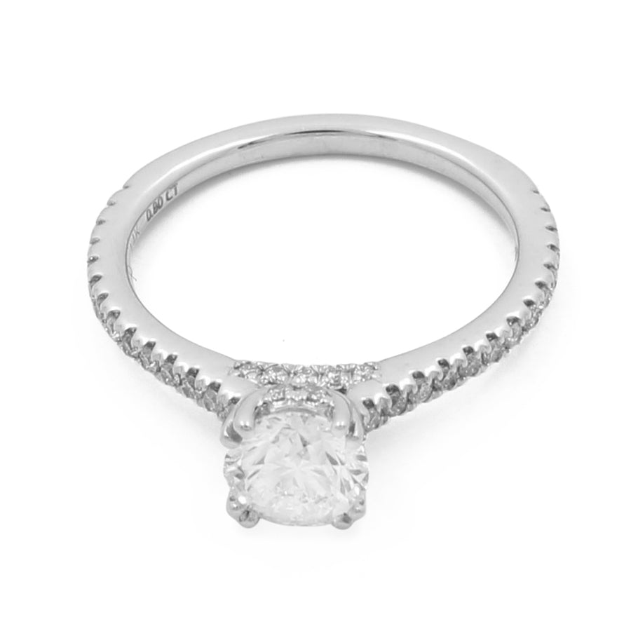 A Miral Jewelry 14K White Gold Women's Contemporary Engagement Ring with 0.20Tw Round Diamonds.
