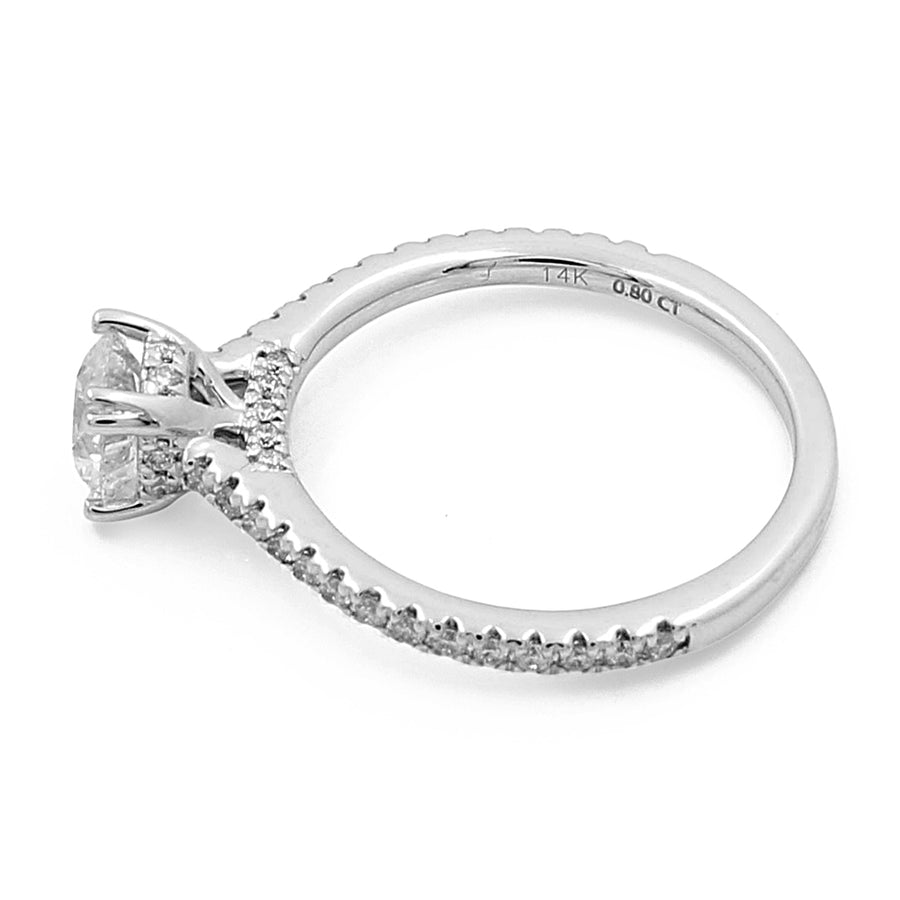 Side view of a stunning **Miral Jewelry 14K White Gold Women's Contemporary Engagement Ring with 0.20Tw Round Diamonds**, showcasing numerous round diamonds along the shank and a larger central diamond in a prong setting.