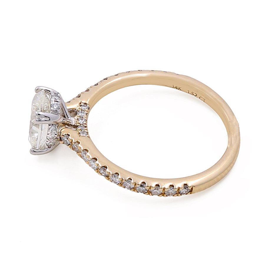 A Miral Jewelry 14K Yellow Gold Women's Contemporary Engagement Ring 1.52 Oval Diamonds-0.64Tw Round Diamonds featuring a large center diamond and smaller diamonds encrusted along the band.