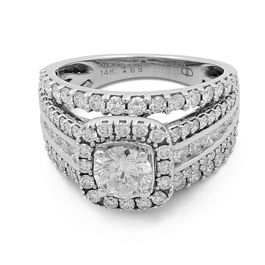 A 14K White Gold Women's Contemporary Wedding Ring 0.62Tw Round Diamonds-1.38Tw Round Diamonds by Miral Jewelry featuring a square cushion cut center diamond, surrounded by a halo of round diamonds, and two rows of additional diamonds on the band, creating a contemporary design.