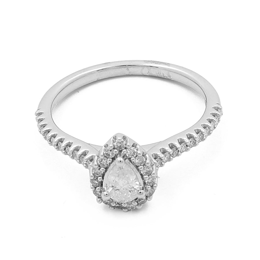 A stunning Miral Jewelry 14K White Gold Women's Contemporary Engagement Pear Ring 0.50Tw Round Diamonds featuring a teardrop-shaped center stone surrounded by small round diamonds, with additional diamonds elegantly lining the band.