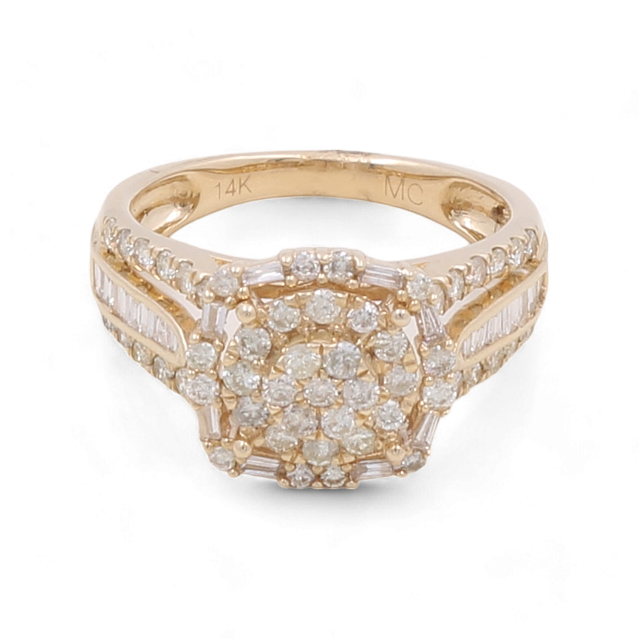 Introducing the 14K Yellow Gold Bridal Woman Ring with Diamonds by Miral Jewelry, featuring a cluster of small round diamonds at the center, flanked by two rows of rectangular diamonds on either side. This exquisite piece is crafted from 14 karat gold and is part of an elegant bridal set.