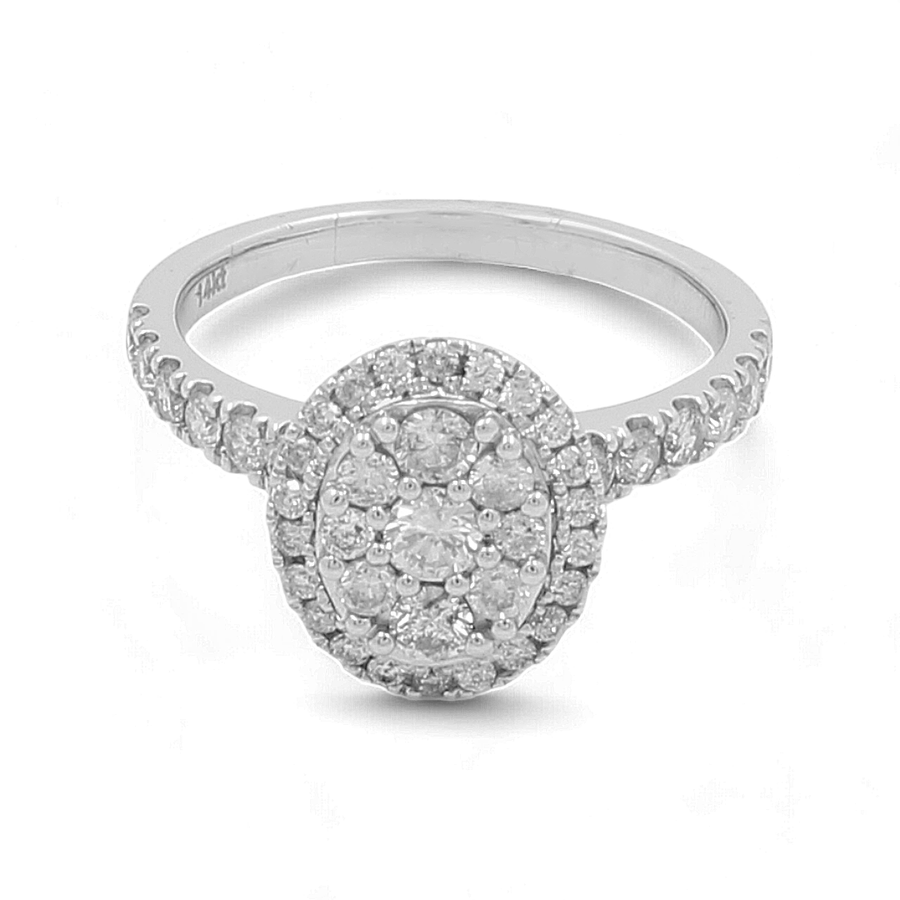 The Miral Jewelry 14K White Gold Bridal Woman Ring with Diamonds is a stunning piece featuring a large oval-shaped cluster of multiple small diamonds on the band and surrounding the central cluster.