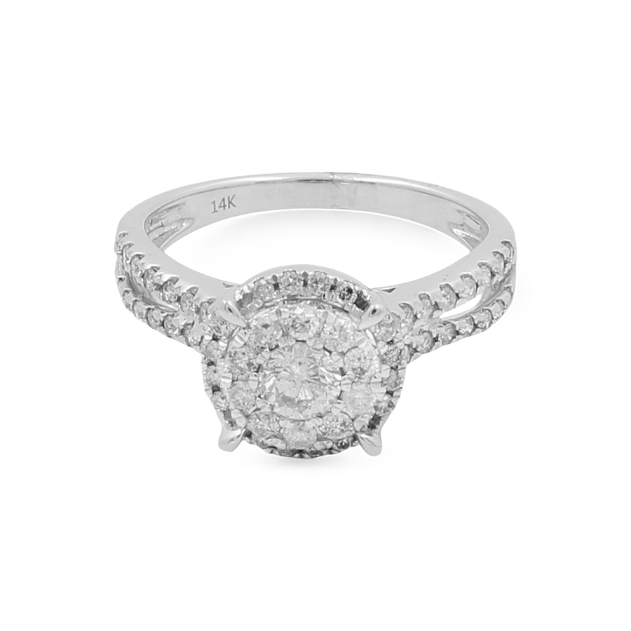 The Miral Jewelry 14K White Gold Women's Contemporary Engagement Ring showcases a stunning large circular diamond setting, complemented by smaller round diamonds adorning the band, exuding modern sophistication.