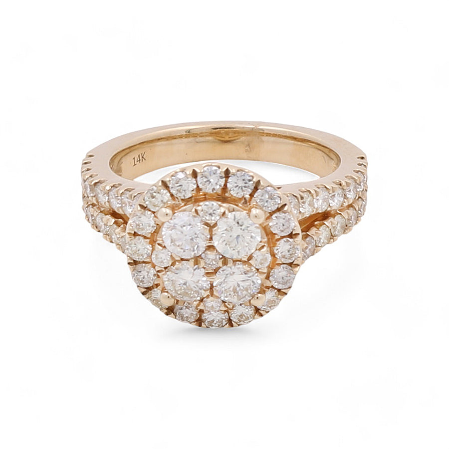 The Miral Jewelry 14K Yellow Gold Women's Contemporary Diamond Engagement Ring showcases a round cluster of multiple small diamonds arranged in a concentric halo design, with additional round diamonds adorning the band.