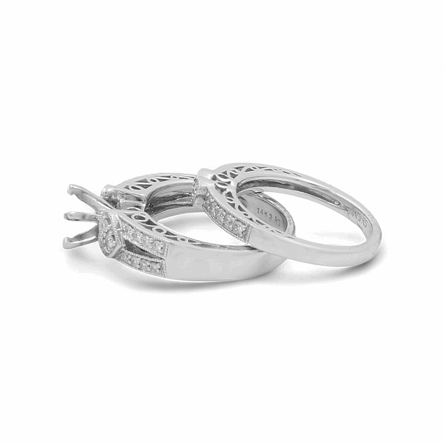 Two "14K White Gold Bridal Woman Rings with Diamonds" by Miral Jewelry, featuring intricate designs and embedded sparkling gemstones, are placed side by side on a white background.