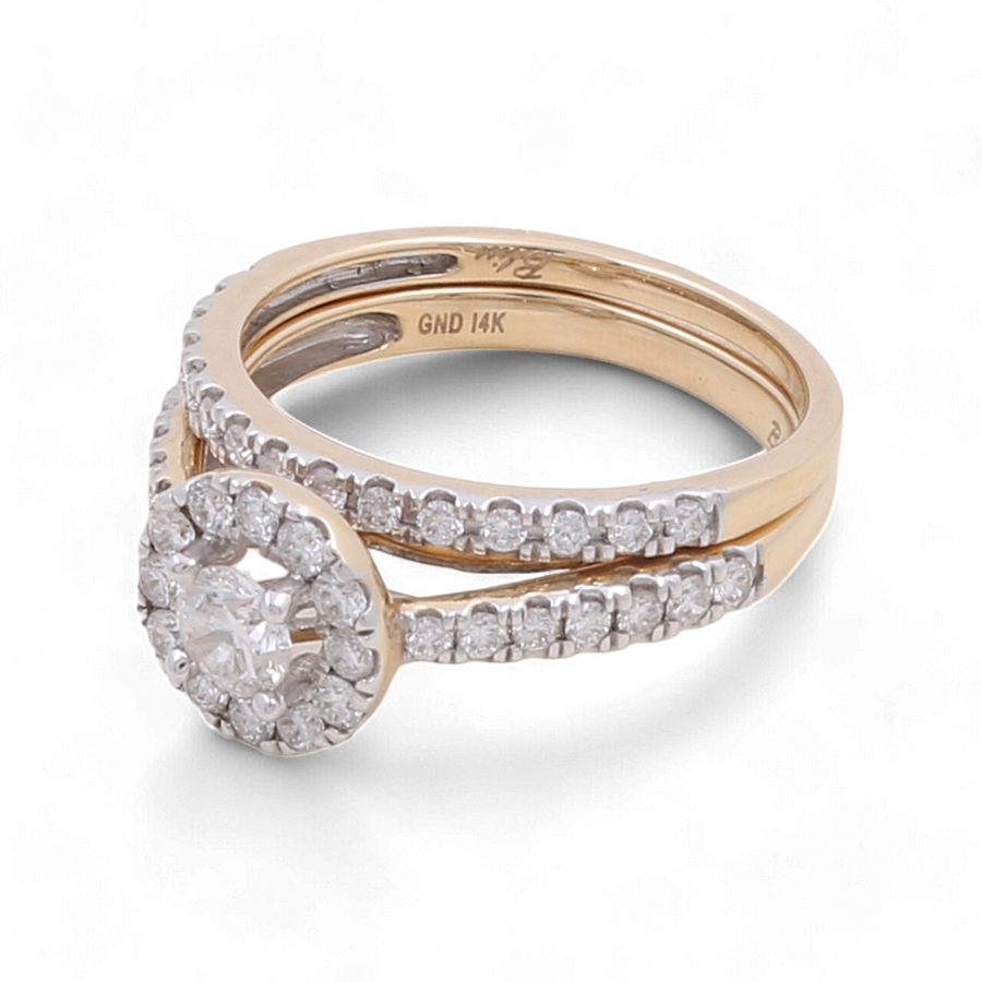 The Miral Jewelry 14K Yellow Gold Bridal Woman Ring with Diamonds showcases a beautifully designed 14K yellow gold band adorned with a circular diamond centerpiece, elegantly enhanced by smaller diamonds.