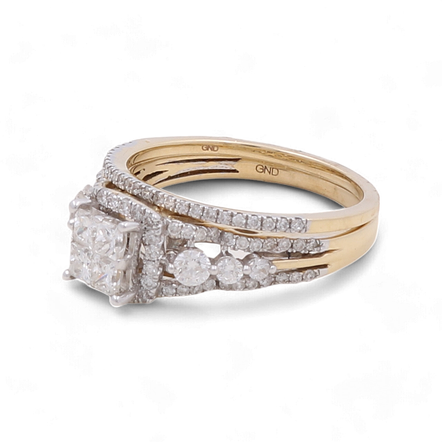 The Miral Jewelry 14K Yellow Gold Bridal Woman Ring with Diamonds showcases a central square diamond surrounded by smaller diamonds arranged in parallel bands and side clusters.