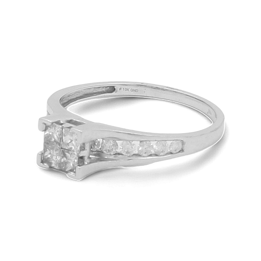 The Miral Jewelry 10K White Gold Bridal Woman Ring with Diamonds features a stunning square-cut central diamond flanked by smaller diamonds gracefully set along the band, making it a perfect choice for any bride.