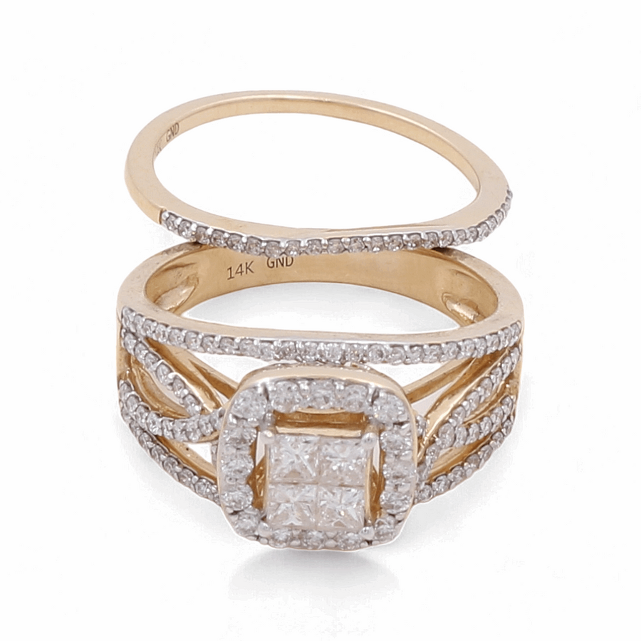 Introducing the breathtaking 14K Yellow Gold Bridal Woman Ring by Miral Jewelry, showcasing a stunning diamond-studded engagement ring with a square center cluster, complemented by a matching diamond-studded wedding band.