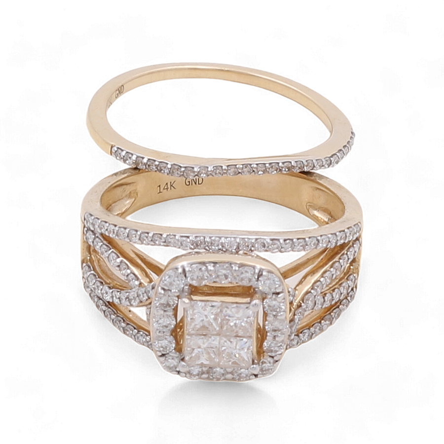 Introducing the breathtaking 14K Yellow Gold Bridal Woman Ring by Miral Jewelry, showcasing a stunning diamond-studded engagement ring with a square center cluster, complemented by a matching diamond-studded wedding band.