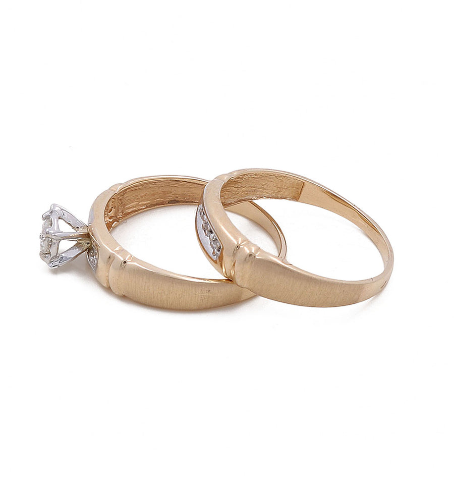 Two bridal rings are displayed: one is a 14K Yellow Gold Bridal Woman Ring with Diamonds by Miral Jewelry, and the other features a simpler design.