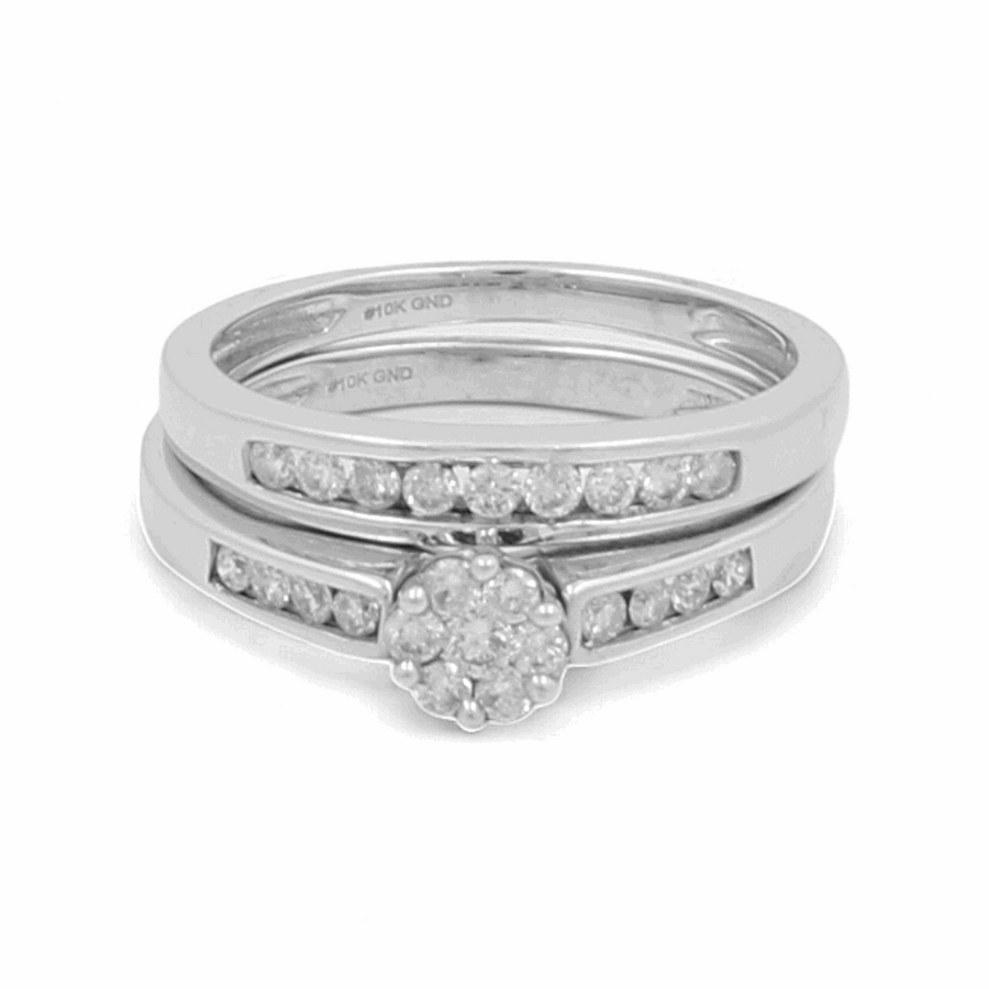 The product is a 10K white gold bridal ring set by Miral Jewelry that includes a central cluster of diamonds on the main band and a matching band adorned with embedded diamonds along the sides.