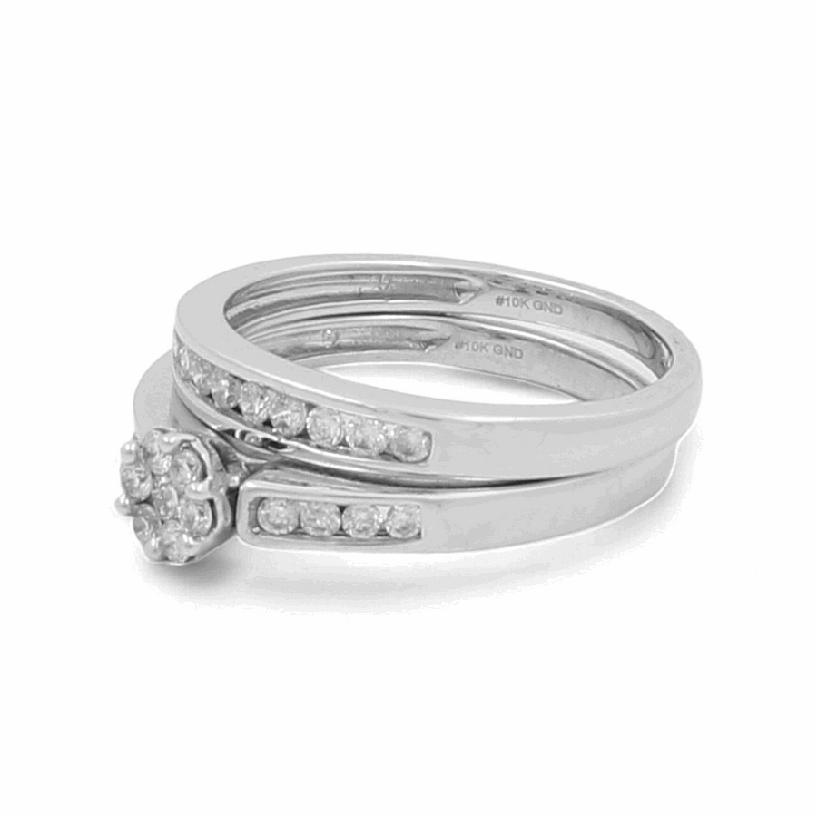 Two exquisite 10K white gold rings from Miral Jewelry; one showcases a stunning diamond cluster, while the other is adorned with a row of smaller diamonds. Simple and elegant in design, these bridal woman rings epitomize refined sophistication.