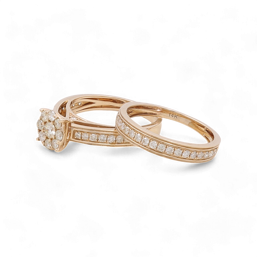 Two bridal rings with inset diamonds from Miral Jewelry; one, the 14K Yellow Gold Bridal Woman Ring with Diamonds, features a cluster of diamonds in a circular design, while the other has a row of small diamonds set along the 10K white gold band.