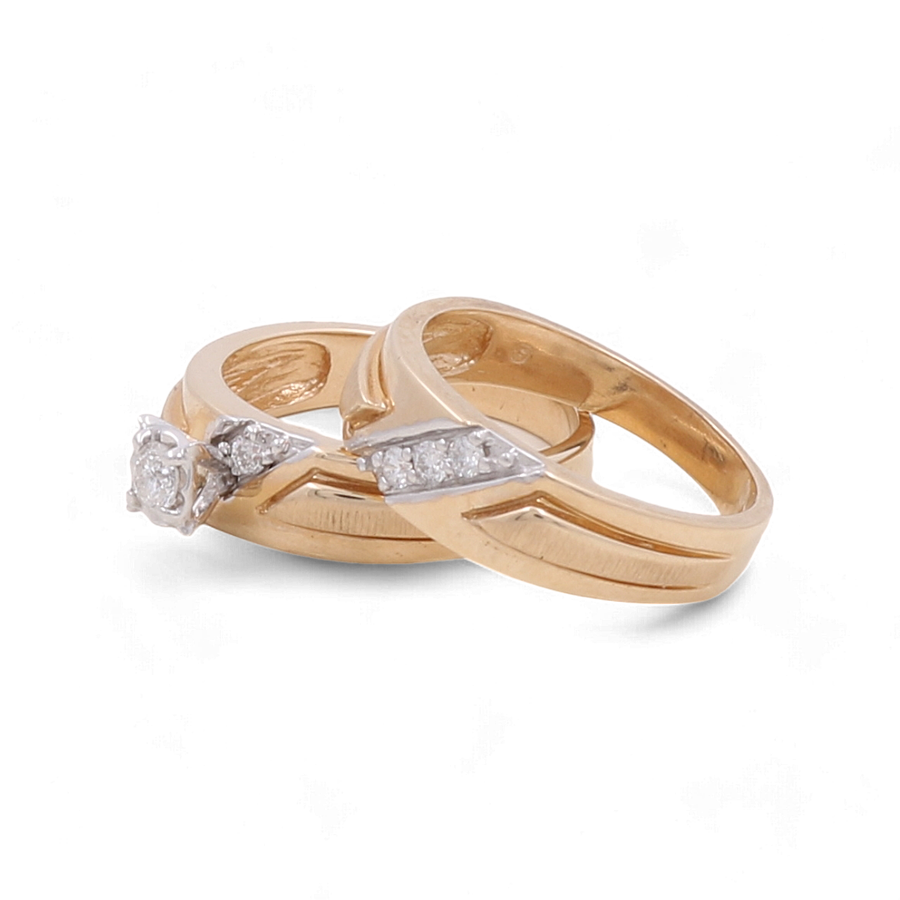 Miral Jewelry offers two exquisite pieces under their "14K Yellow Gold Bridal Woman Ring with Diamonds" collection: one ring showcases a single, larger diamond, while the other is adorned with multiple smaller diamonds arranged in an elegant triangular pattern.