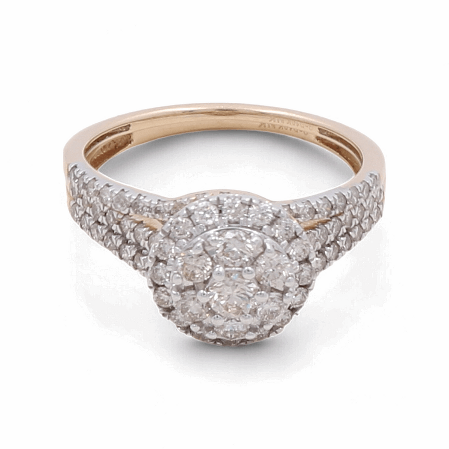 A stunning 14K yellow gold bridal woman's ring by Miral Jewelry, showcasing a round center cluster of diamonds and additional diamonds set along the band.