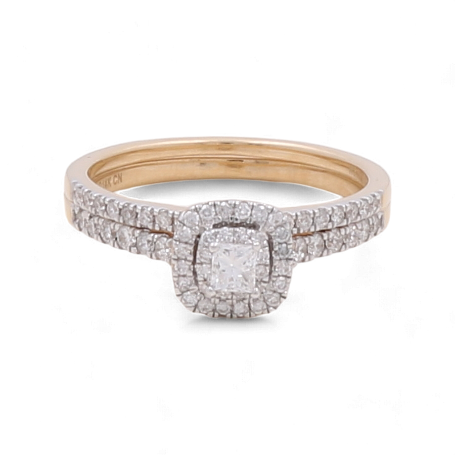 The Miral Jewelry 14K Yellow Gold Bridal Woman Ring with Diamonds features a square-shaped diamond centerpiece surrounded by smaller diamonds, with additional luxury diamonds encrusted on the band.