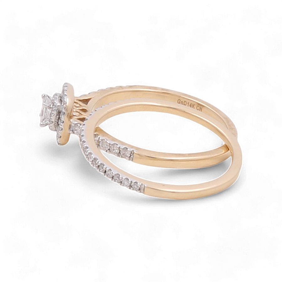 The Miral Jewelry 14K Yellow Gold Bridal Woman Ring with Diamonds features a square-cut diamond center and a band adorned with smaller diamonds along half of the ring.