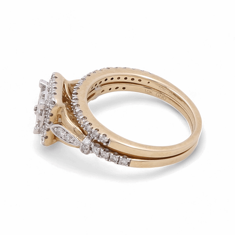 The Miral Jewelry 10K Yellow Gold Bridal Woman Ring with Diamonds is an exquisite engagement ring set. One band features a square cluster of diamonds, while the other is adorned with smaller diamonds around the band. This stunning design is also available in 14K yellow gold.