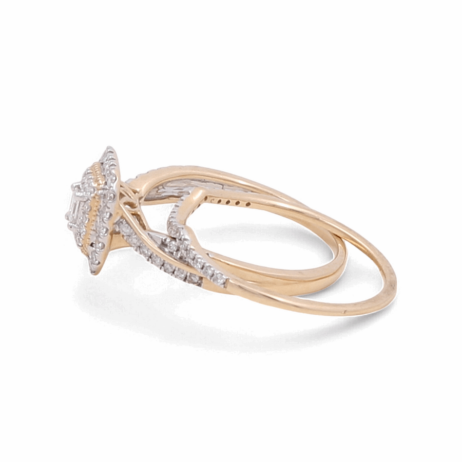 A 14K Yellow Gold Bridal Woman Ring with diamonds by Miral Jewelry, featuring a round diamond centerpiece and a split band design, epitomizing a timeless symbol of love.