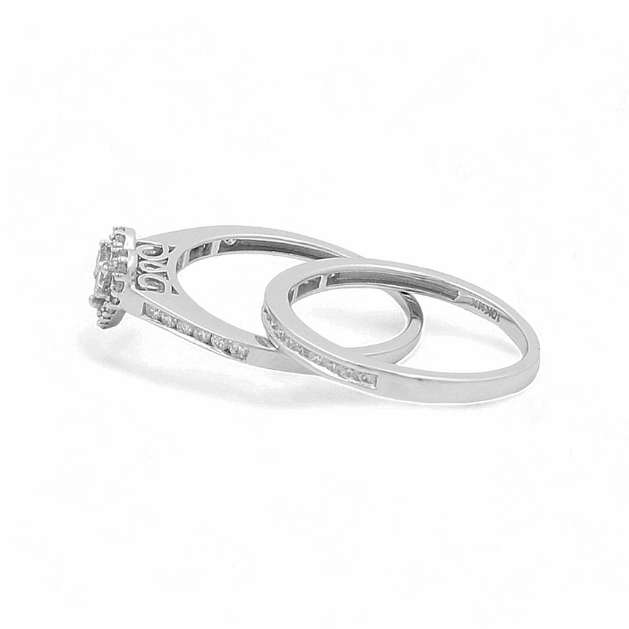 The image showcases two beautiful rings from Miral Jewelry: one featuring a central diamond with intricate side details and the other a sleek, simple band. The 10K White Gold Bridal Woman Ring with Diamonds perfectly blends the elegance of diamonds with timeless designs, making it an ideal addition to any bridal woman's ring collection.