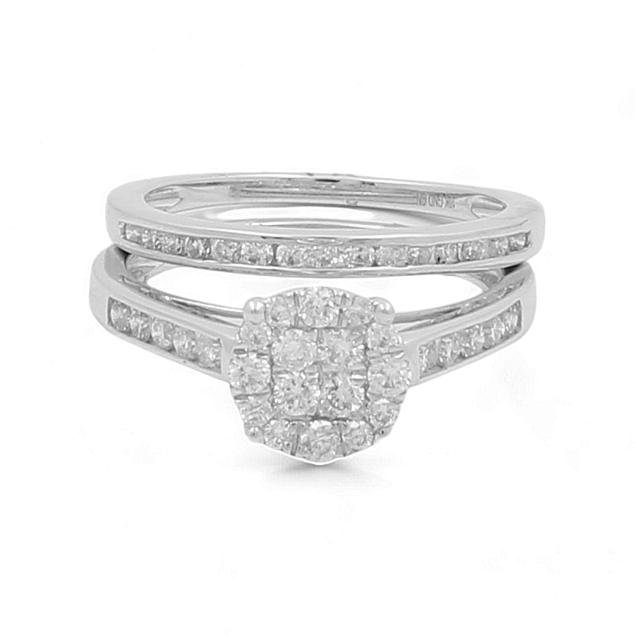 The 10K White Gold Bridal Woman Ring by Miral Jewelry showcases a central round cluster of diamonds complemented by smaller diamonds intricately embedded in the split shank band.