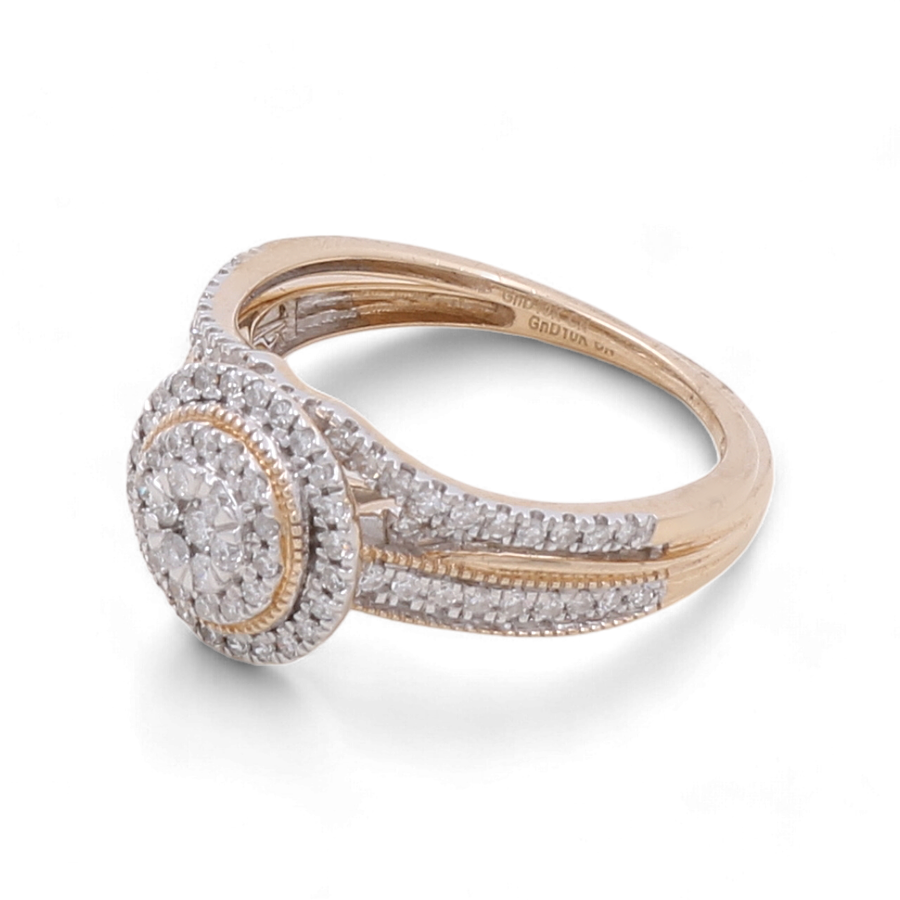 Experience luxury and elegance with the Miral Jewelry 10K Yellow Gold Bridal Woman Ring with Diamonds, featuring a double halo setting of numerous small diamonds around a dazzling central cluster.