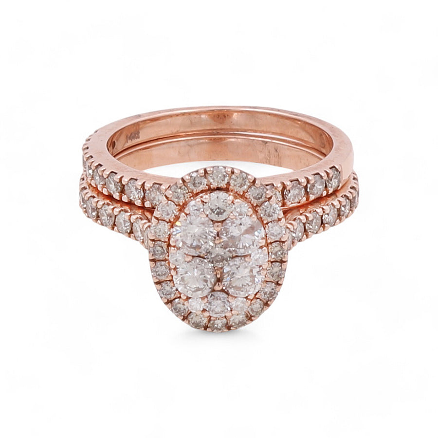 Introducing the 14K Rose Gold Bridal Diamond Women's Ring by Miral Jewelry, featuring a stunning oval cluster of diamonds set within a sparkling diamond halo and band.