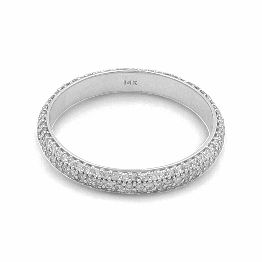 A stunning 14K White Gold Bridal Woman Ring with Diamonds by Miral Jewelry, adorned with small diamonds covering its entire surface, perfect for completing any bridal ensemble.