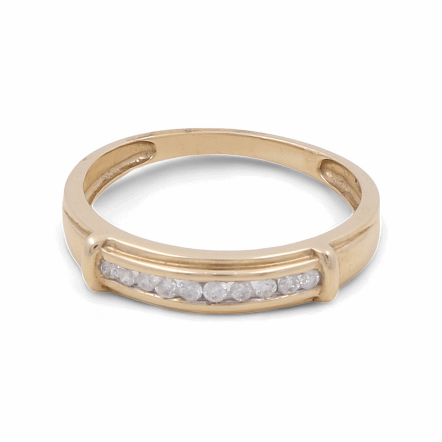 The Miral Jewelry 14K Yellow Gold Bridal Men's Ring with Diamonds features a straight row of small diamonds set in the band.